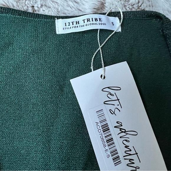 Sanibel Emerald Shimmer Mini Dress
by 12th Tribe - Picture 6 of 6